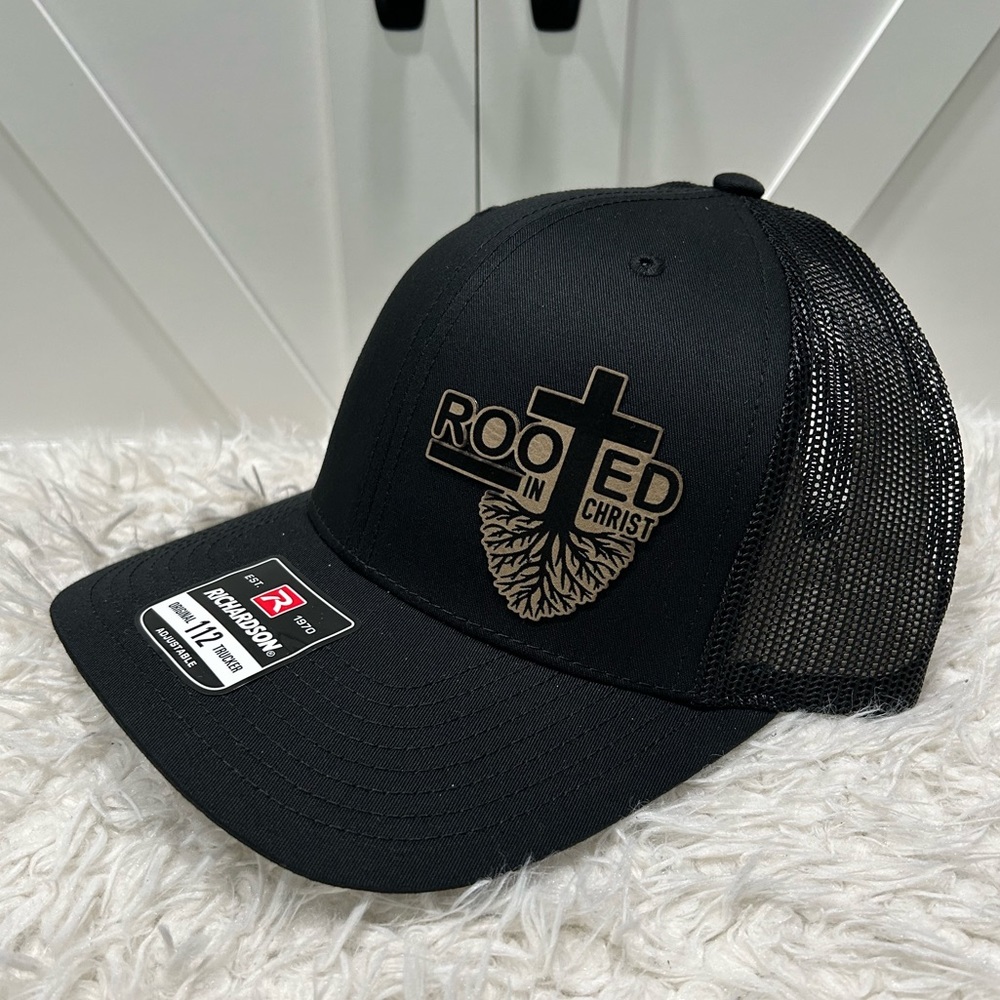 Laser engraved. Rooted in Christ. Richardson 112 trucker hat.